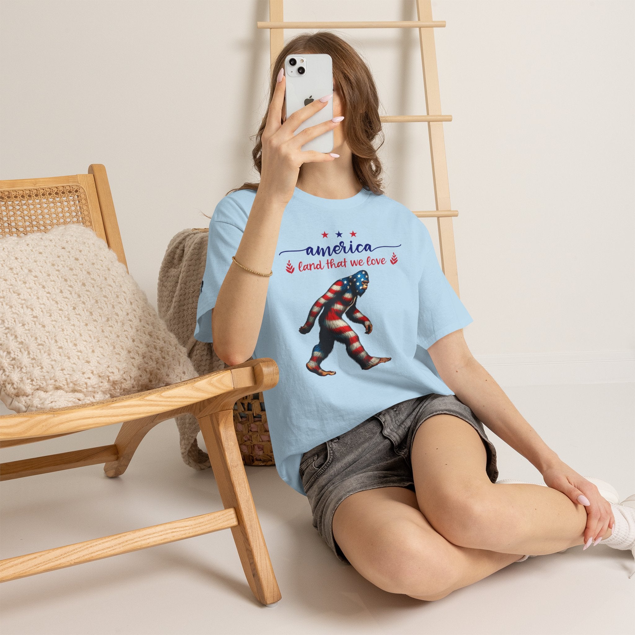 America “Land That We Love” Patriotic T‑Shirt — Flag Sasquatch Graphic Tee