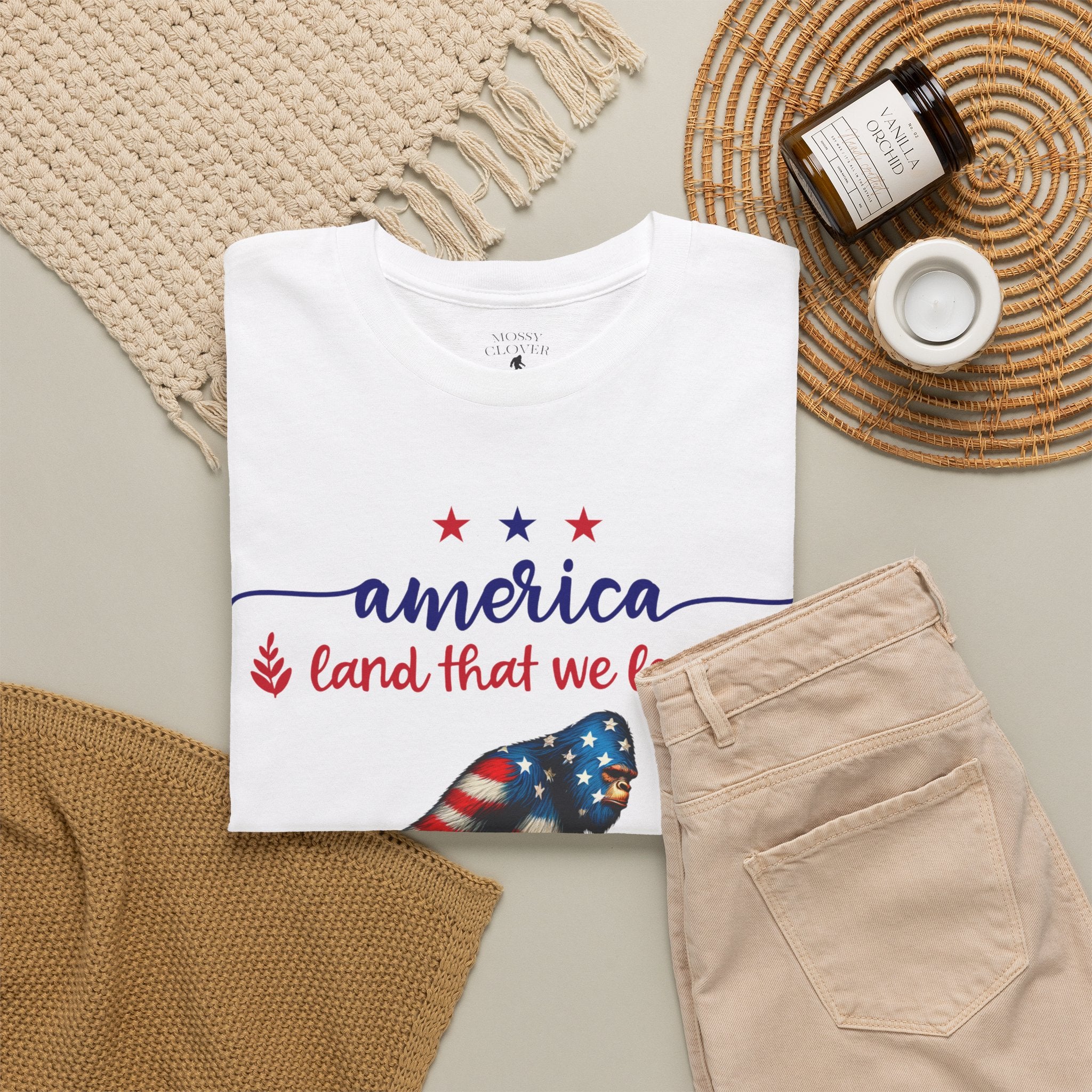 America “Land That We Love” Patriotic T‑Shirt — Flag Sasquatch Graphic Tee