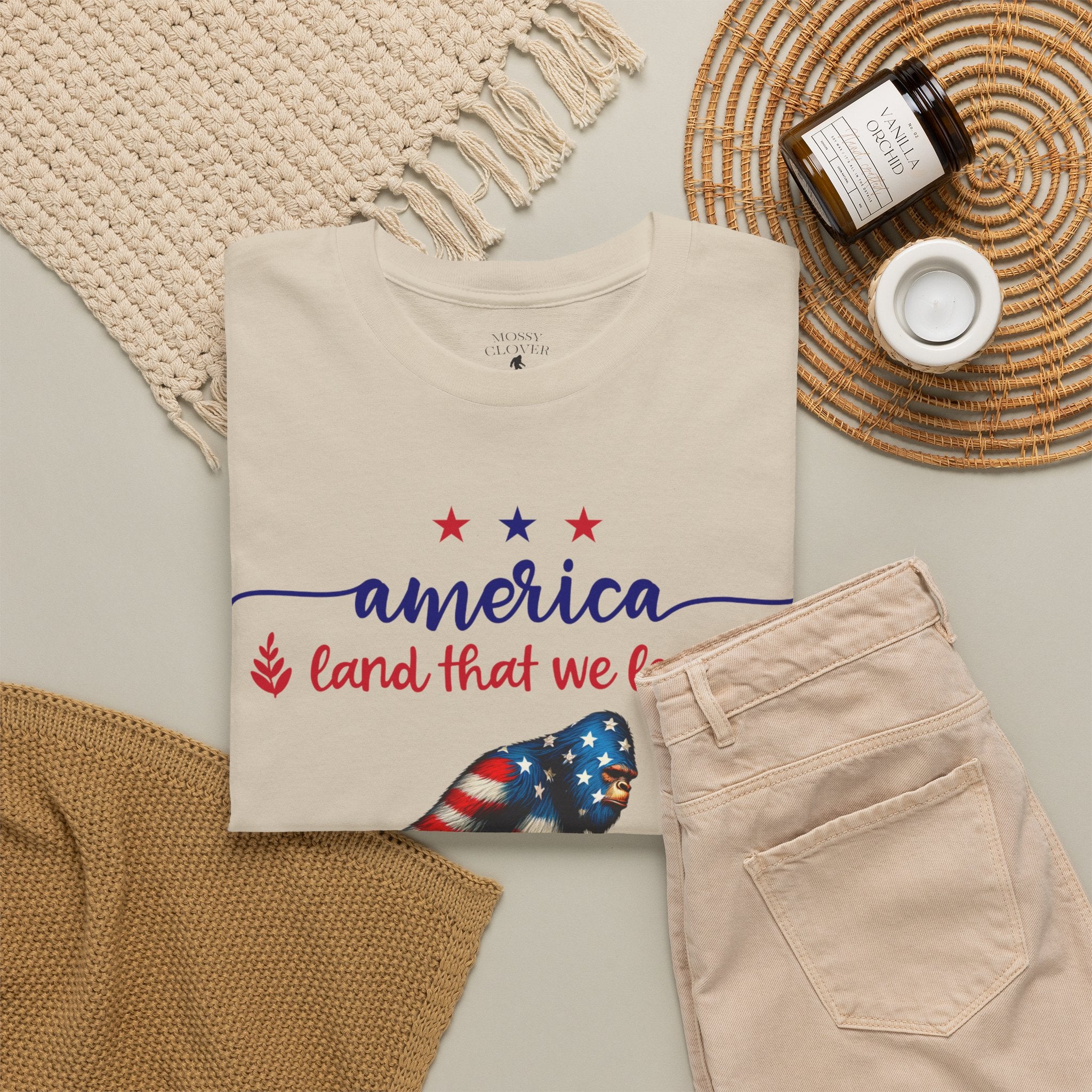 America “Land That We Love” Patriotic T‑Shirt — Flag Sasquatch Graphic Tee