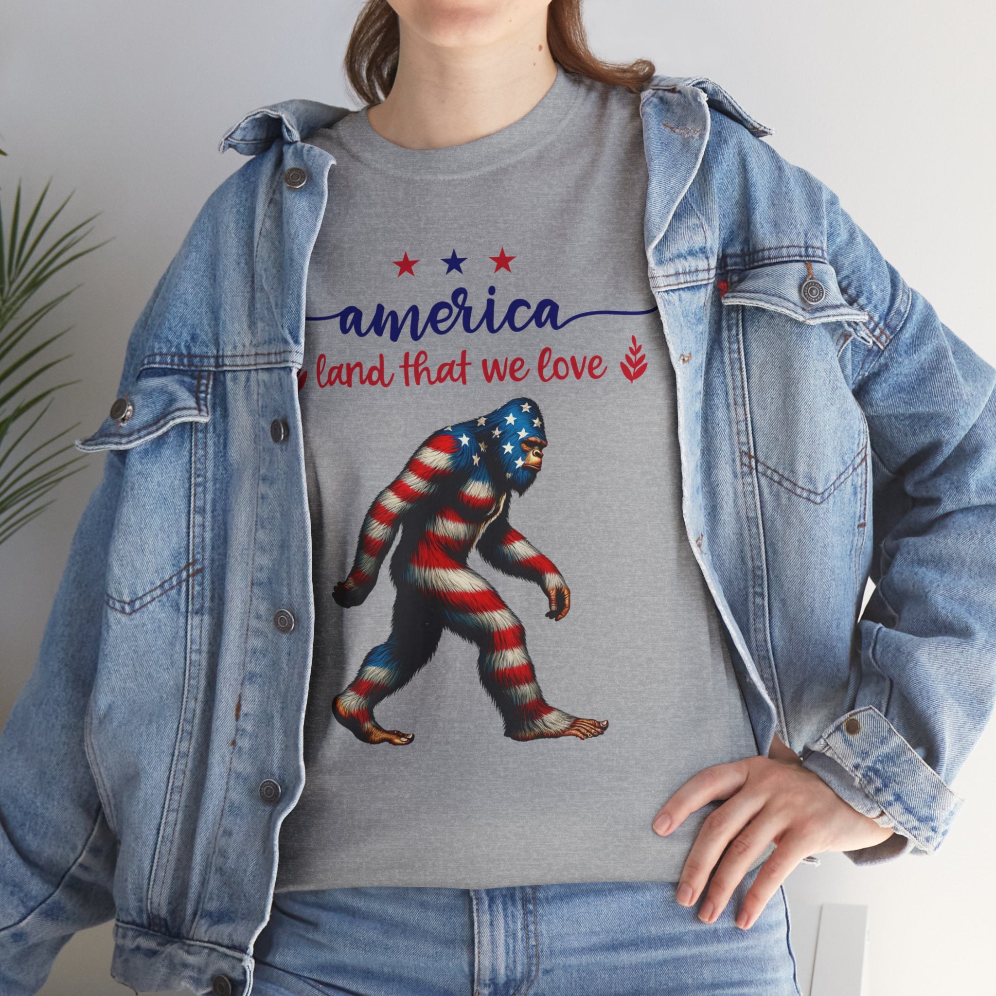 America “Land That We Love” Patriotic T‑Shirt — Flag Sasquatch Graphic Tee