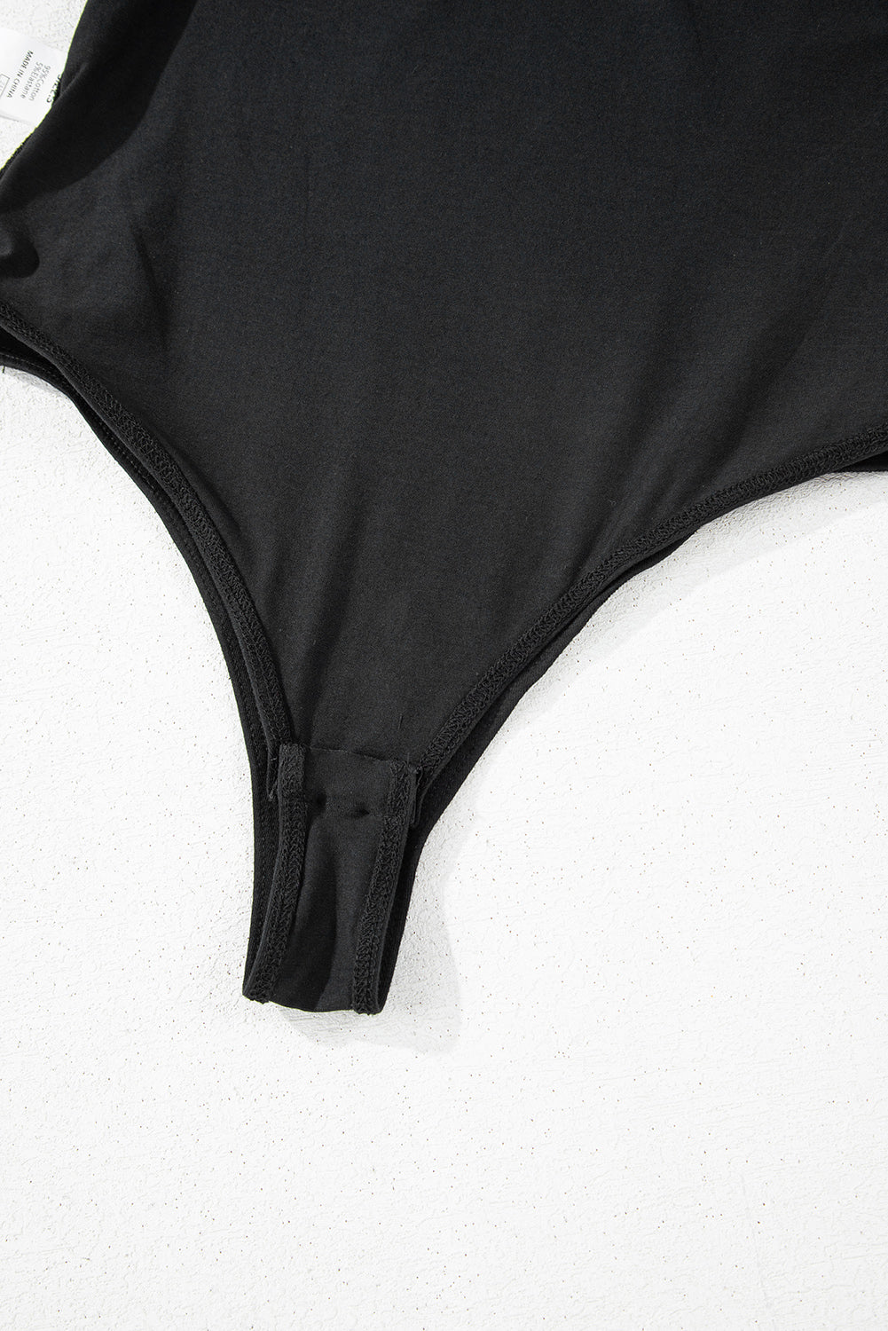 The Noir One-Shoulder Bodysuit
